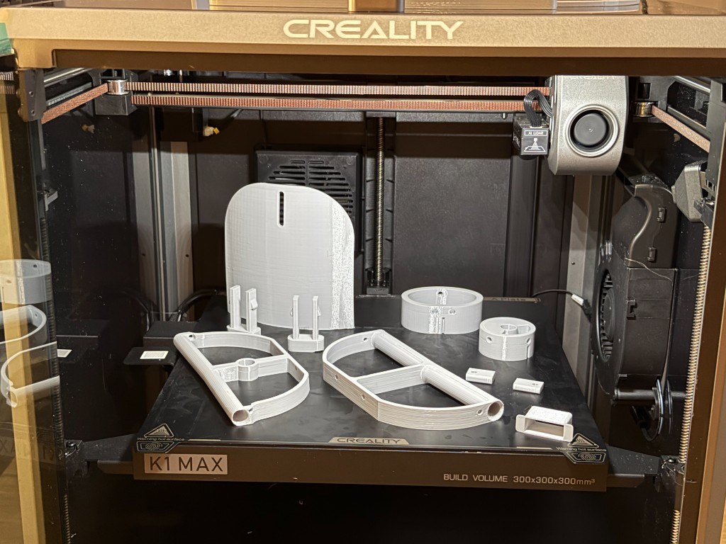 Creality K1 Max — BW-C45 prototype components on build plate